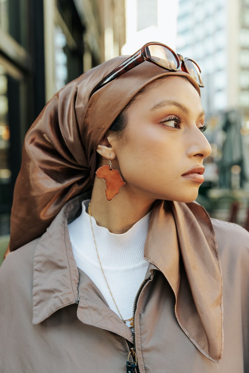 Portrait of Stylish Woman Wearing Hijab in the City